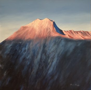 A painting of a mountain peak illuminated by the warm light of sunrise, transitioning from deep shadow to radiant pinks and oranges, with a serene sky in the background.