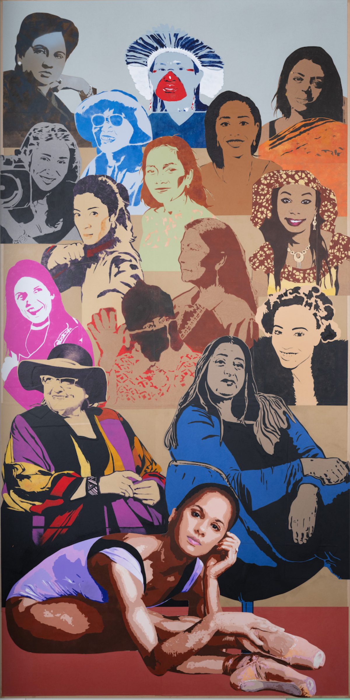 A mural panel featuring a diverse array of women, including Indigenous, African, and Asian figures, depicted in bold stencil-like portraits, with a ballerina reclining at the bottom.