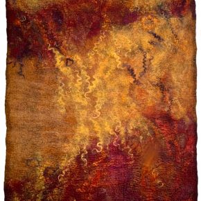 A vibrant, abstract felt artwork featuring swirling patterns in rich hues of gold, red, and orange. The texture showcases intricate details with soft, curly accents.